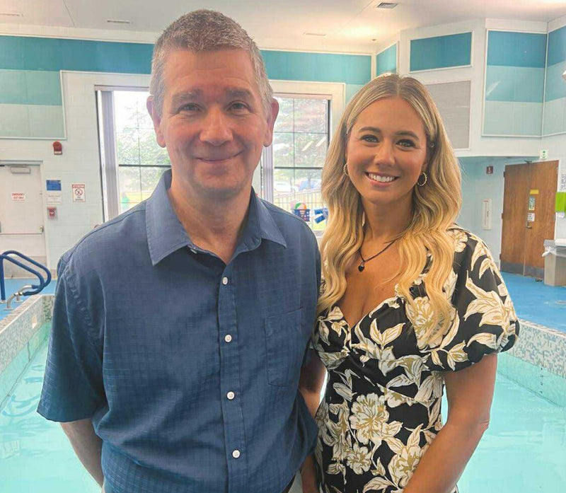 Perrysburg Rotarian Mike McGivern and Shannon Bova, Sunshine Communities Chief Philanthropy Officer, are pictured in front of the facilities’ therapeutic pool. 